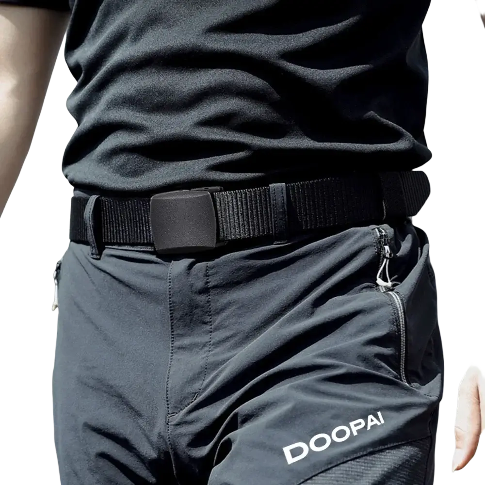 Black woven nylon tactical belt with matte black plastic buckle worn with pants branded doopai for men outdoor use
