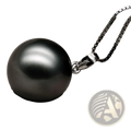 A tahitian black pearl pendant silver necklace with a lustrous black pearl and elegant 18k gold clasp on a sleek chain