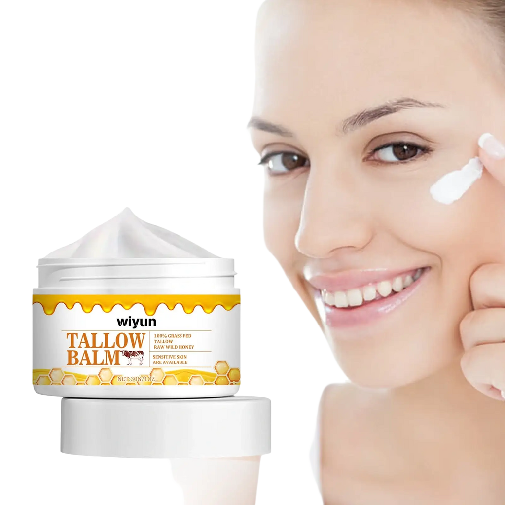 White jar of wiyun tallow balm with yellow honey label and a dollop of white raw honey anti wrinkle cream top