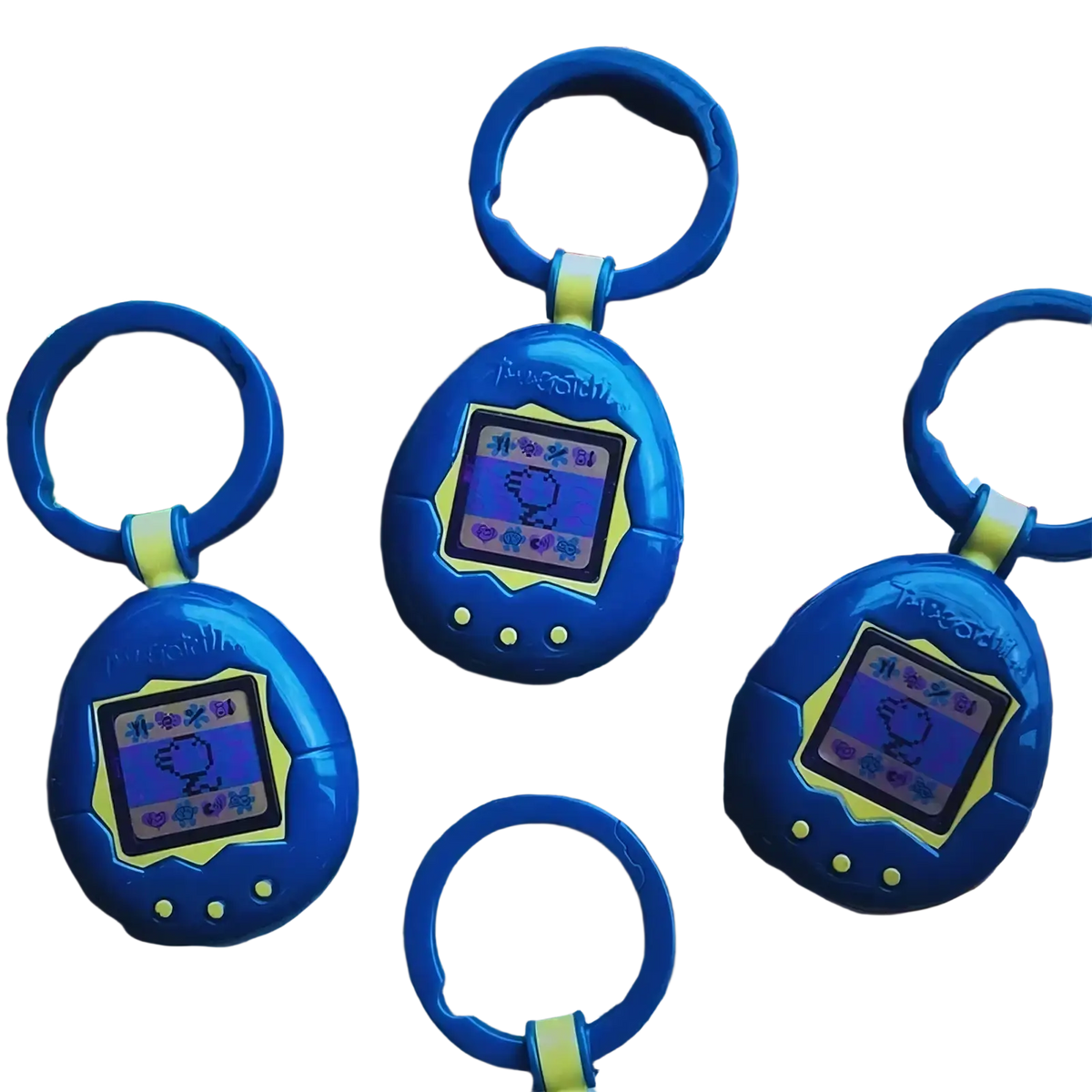 Tamagotchi electronic virtual pet keychain 90s toy in blue with yellow accents and pixelated digital screen display