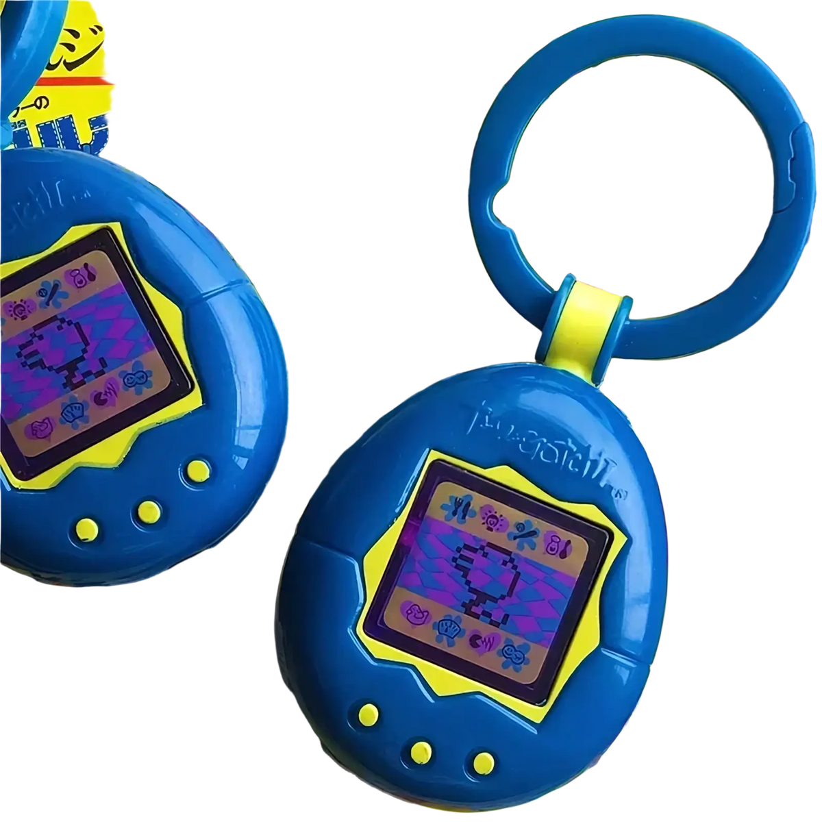 Blue plastic tamagotchi electronic virtual pet keychain with yellow border displaying pixelated creatures on screen