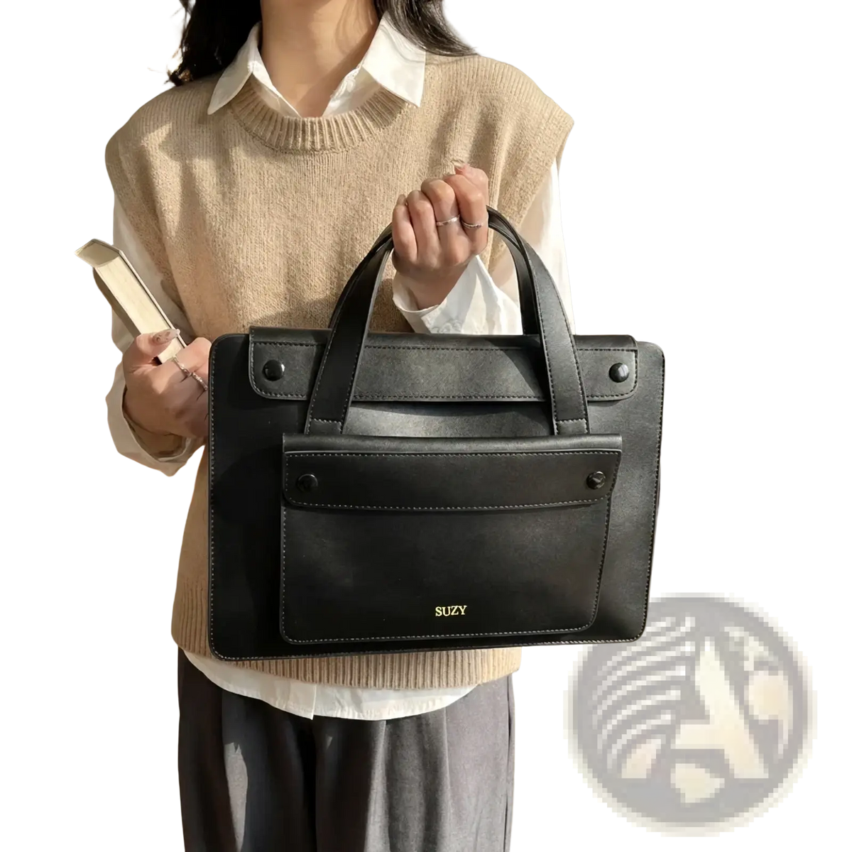 Black leather satchel with top handle and front flap featuring gold-tone branding for women laptop briefcase