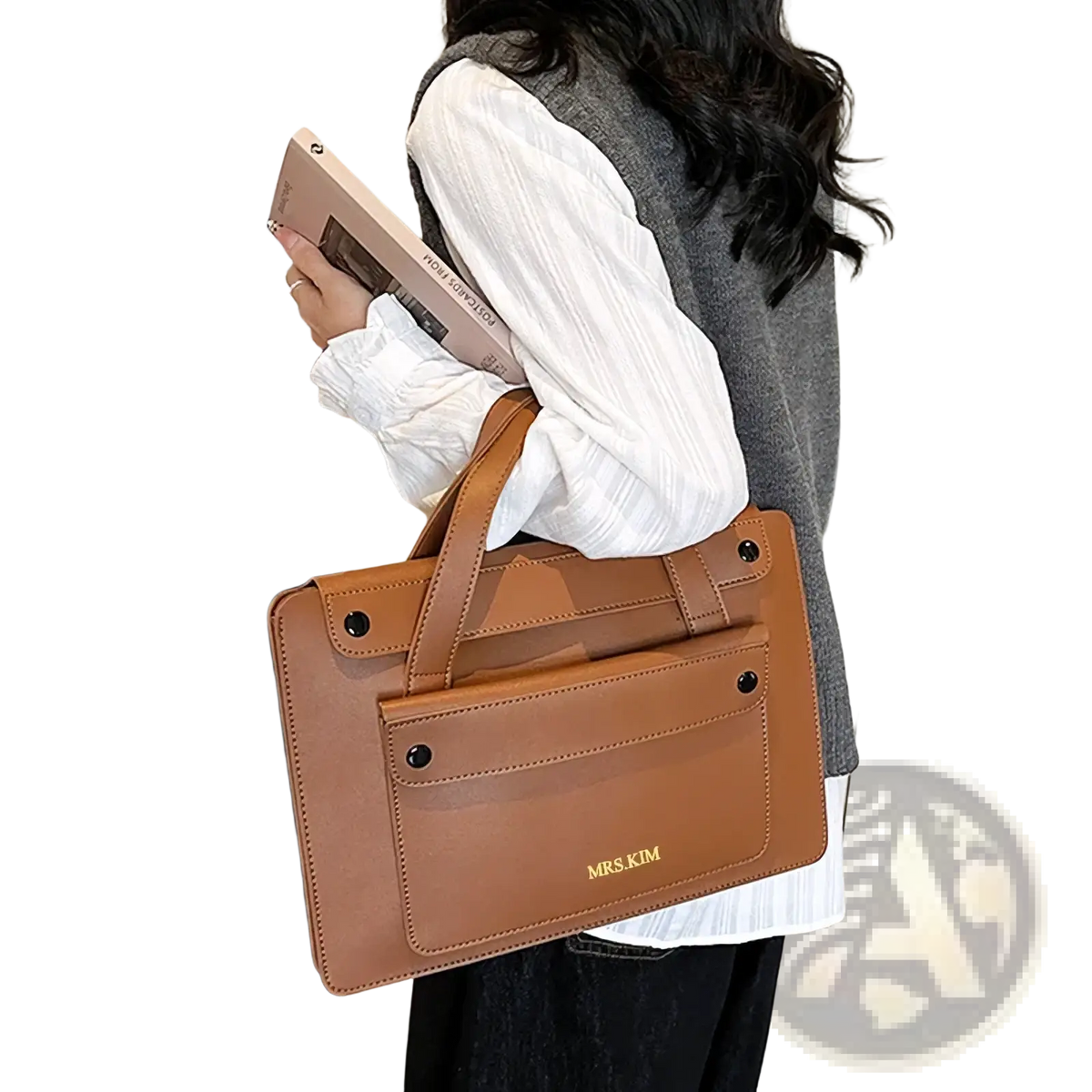 Tan leather laptop briefcase for women with structured design and gold-tone mrs.kim branding