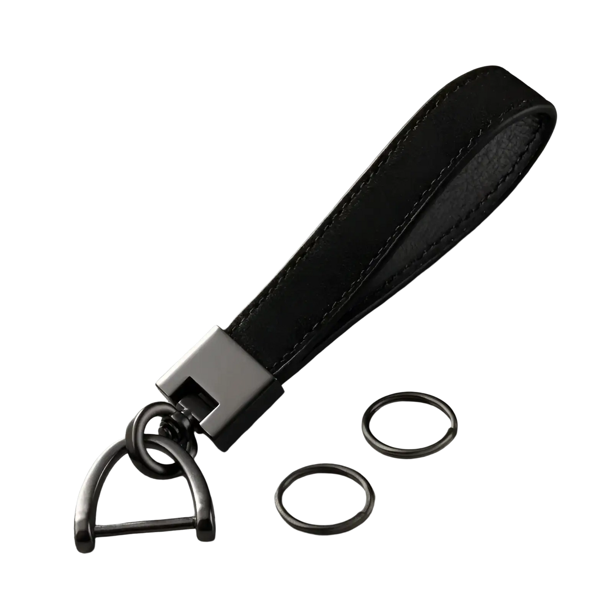 Black leather car keychain ring with matte black metal d-ring rectangular connector and two additional metal rings
