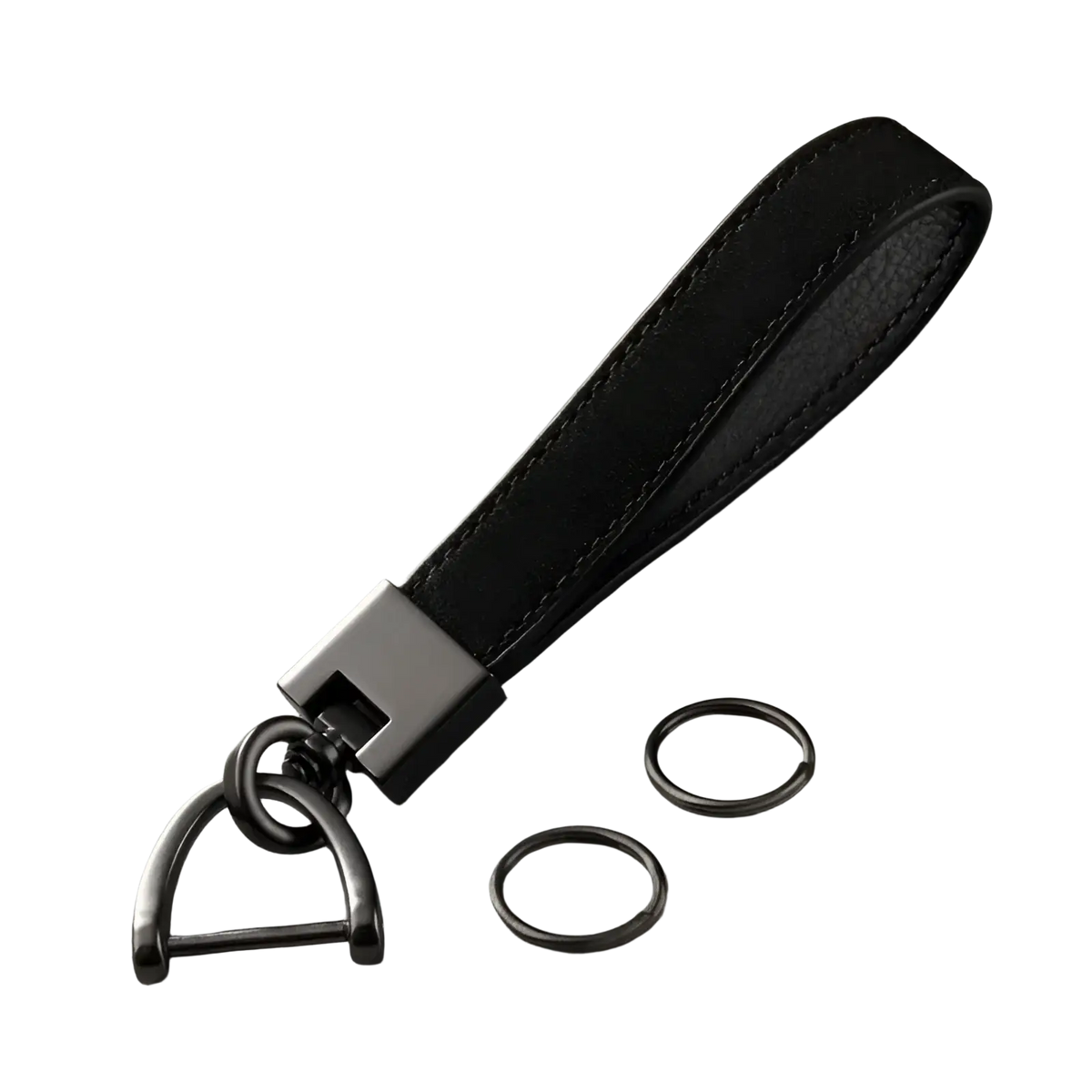 Tan suede leather car keychain ring featuring a black leather fob with matte black metal d-ring and rectangular clasp