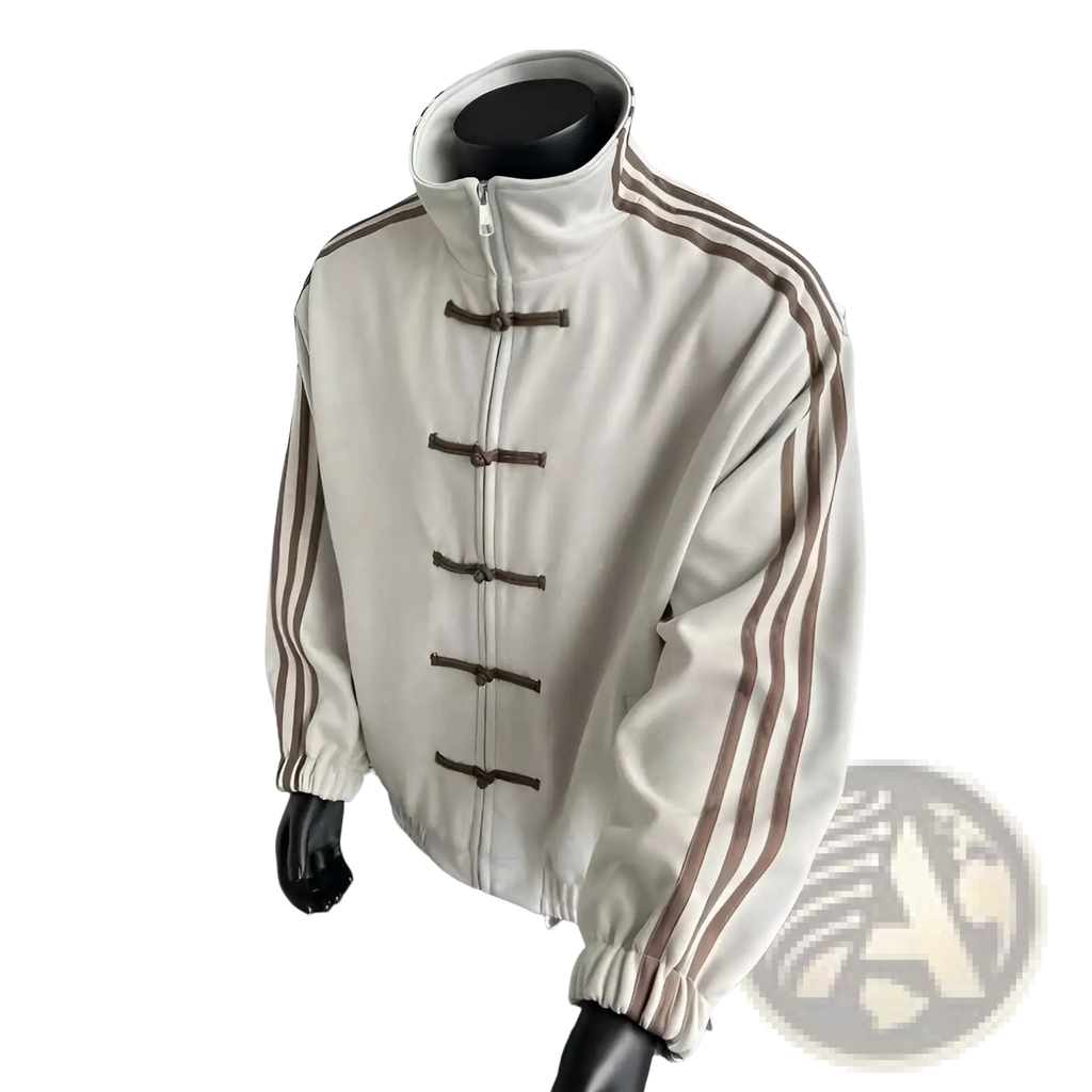 Cream-colored tang style fleece sport jacket with brown striped sleeves and toggle closures made of soft fleece
