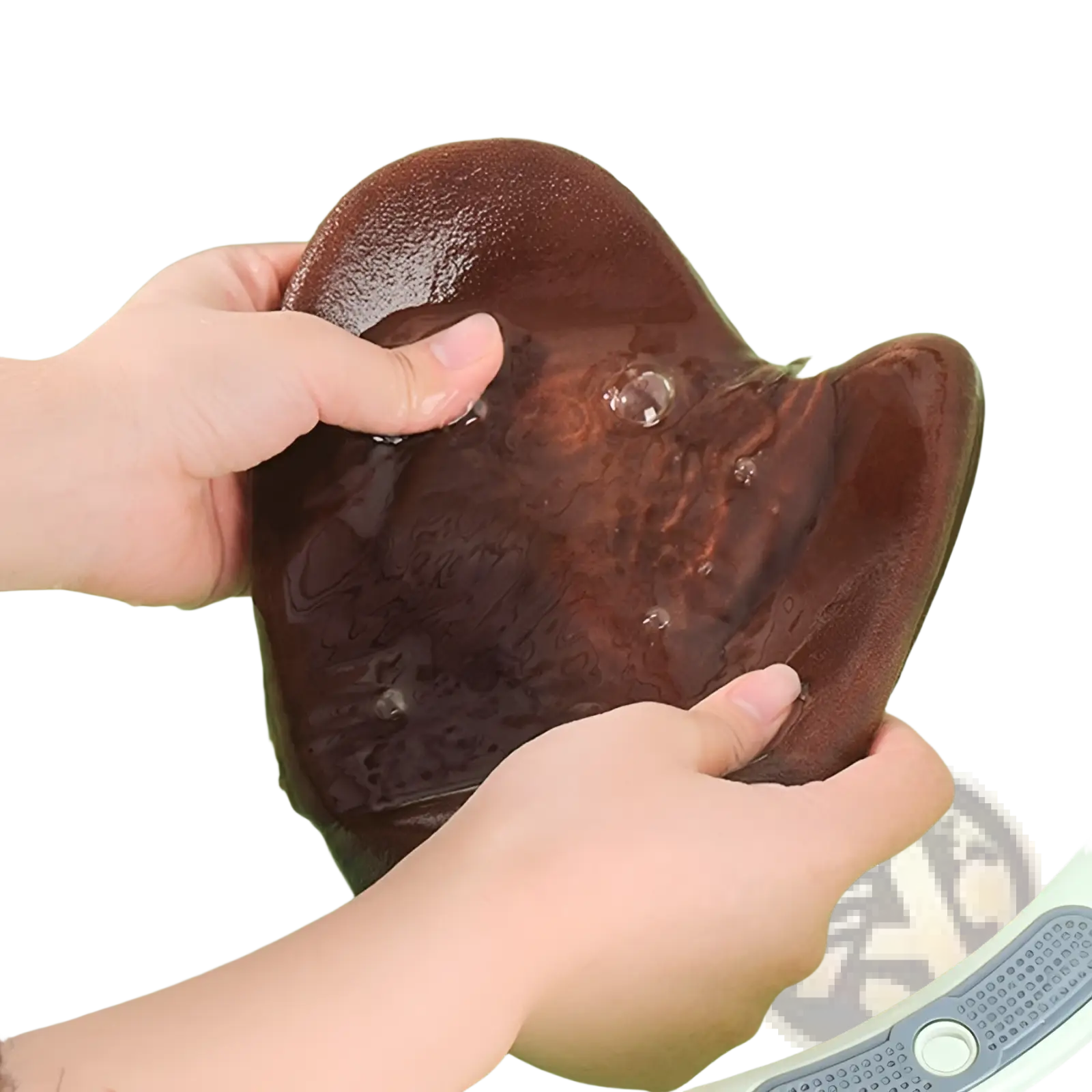 Dark brown glossy rubber shoe insole with textured surface being washed by hands in tanning mitt and exfoliating glove set