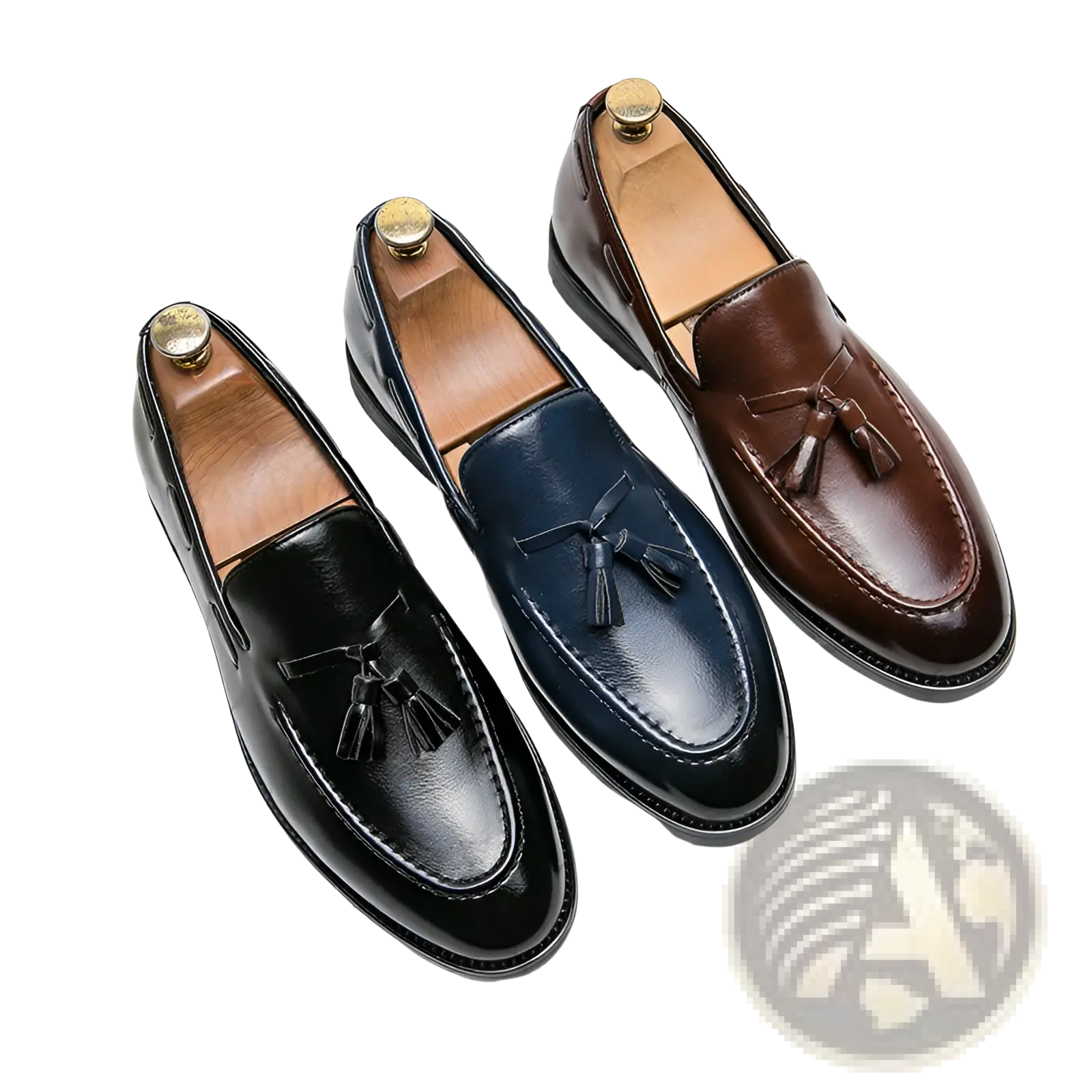Three pairs of polished leather tassel loafers in black navy blue and brown slip on shoes for formal wear