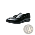Black leather tassel loafers with polished finish and classic slip-on design for formal and casual wear