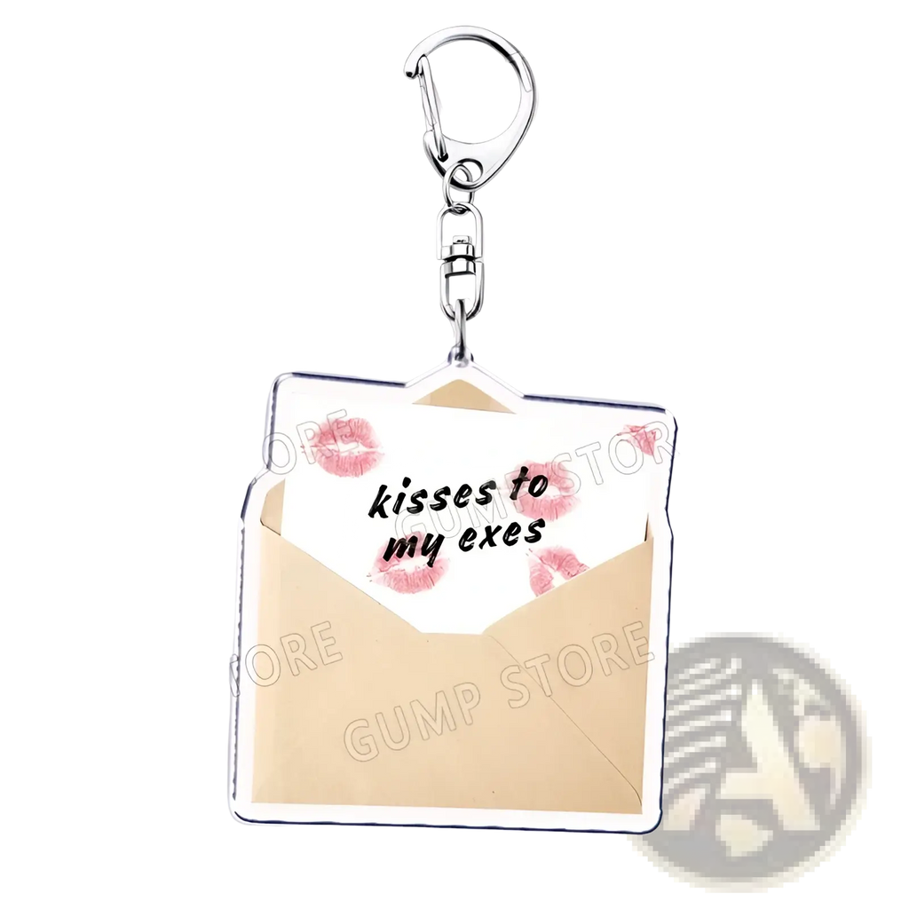 Silver-framed acrylic keychain shaped like an open envelope with beige interior and pink lipstick kiss marks featuring kisses to my exes text