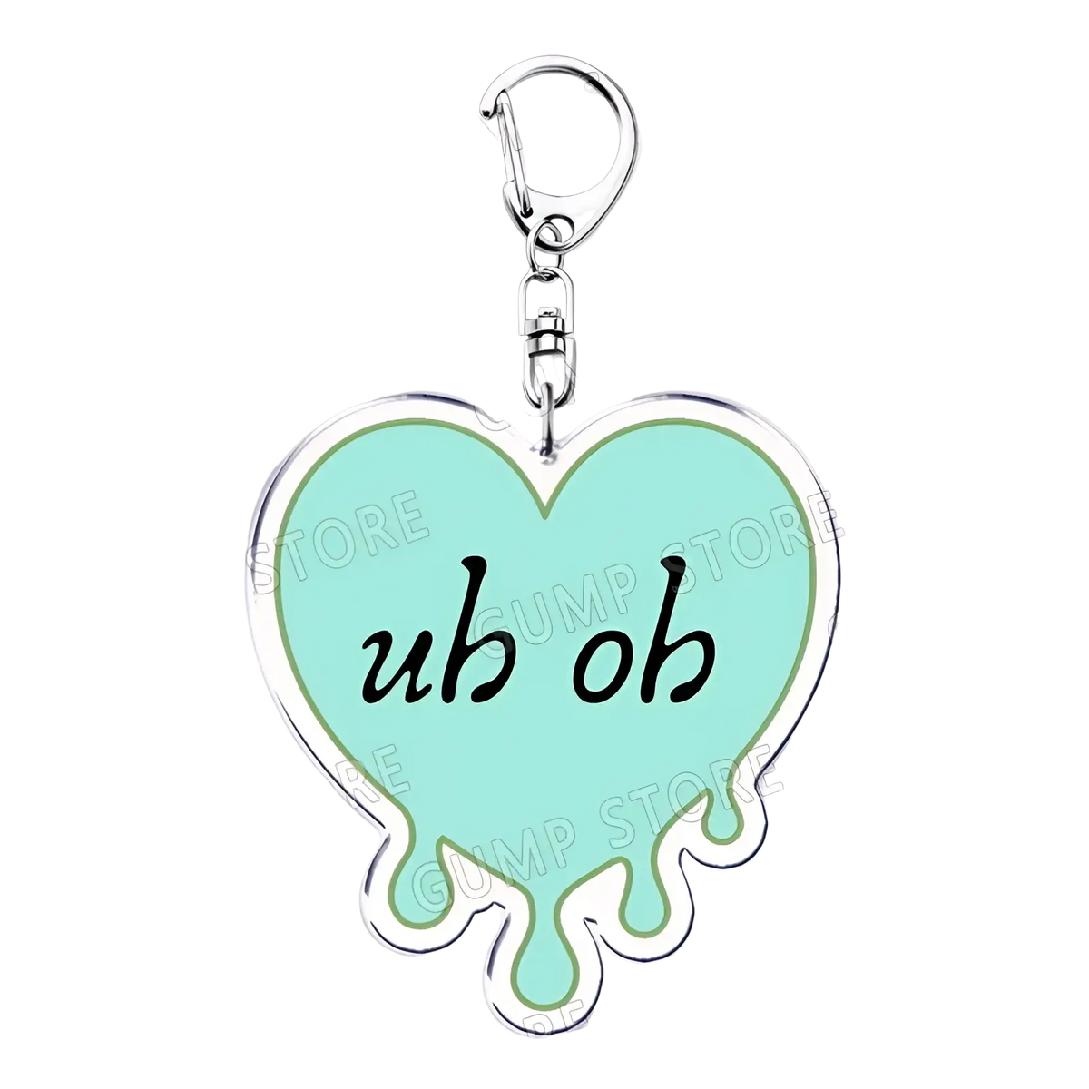 A mint green heart-shaped acrylic Tate Mcrae keychain with silver outline and uh oh text for music fan gifts