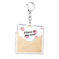 Silver-framed acrylic keychain shaped like an open envelope with beige interior and pink lipstick kiss marks featuring kisses to my exes text
