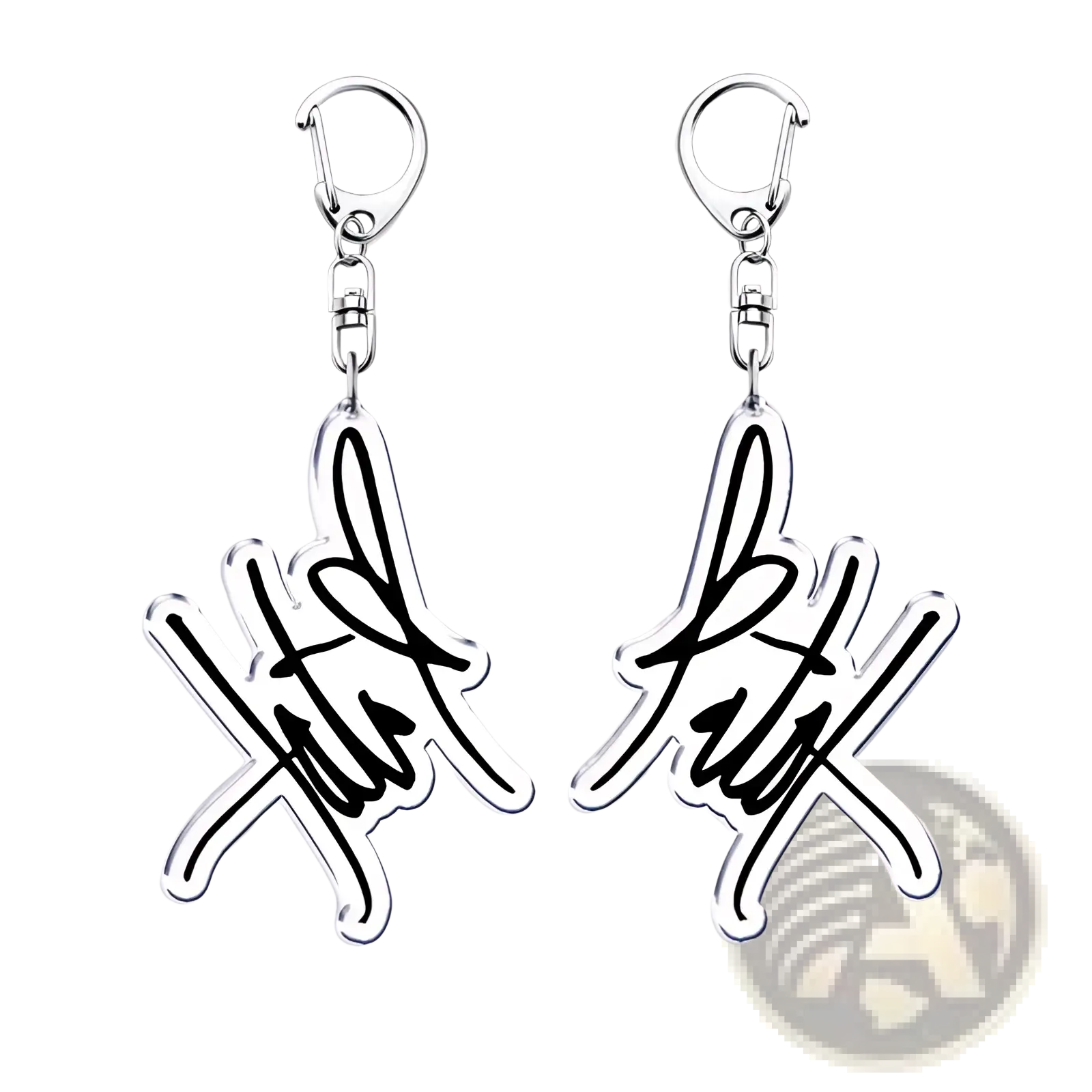 Silver acrylic Tate Mcrae keychain with stylized signature design and black ink detailing for music fan gift