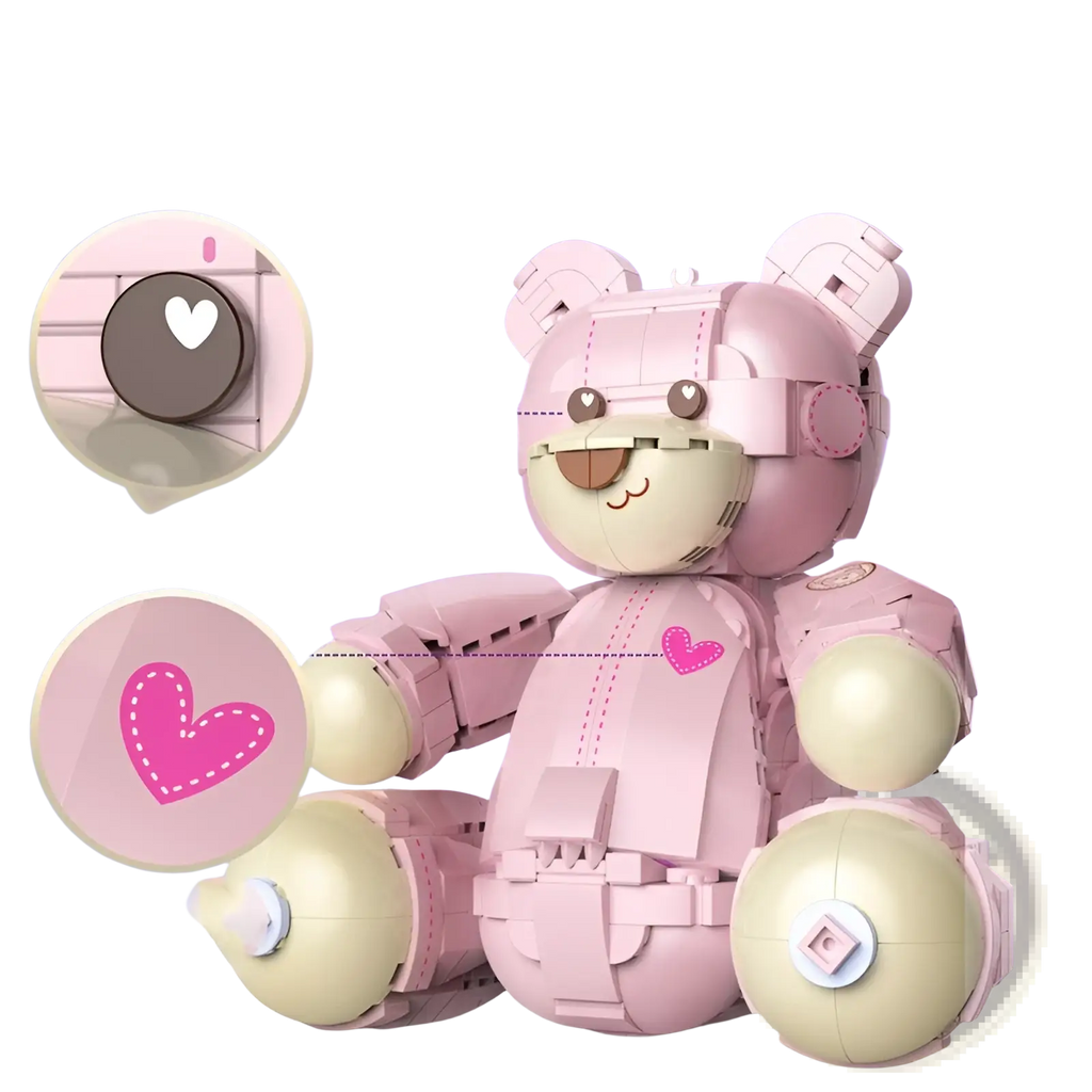Pink and cream-colored robotic teddy bear made of interlocking plastic bricks with heart-shaped accents on chest and ears