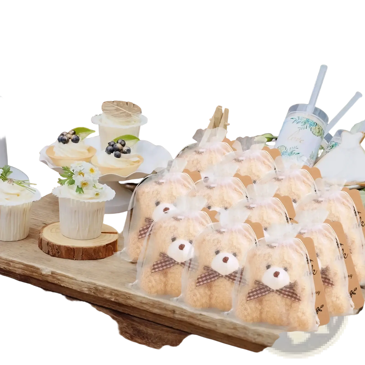 Teddy bear favors with organza bags set featuring cute beige teddy bear-shaped cookies in clear cellophane bags with brown plaid bows