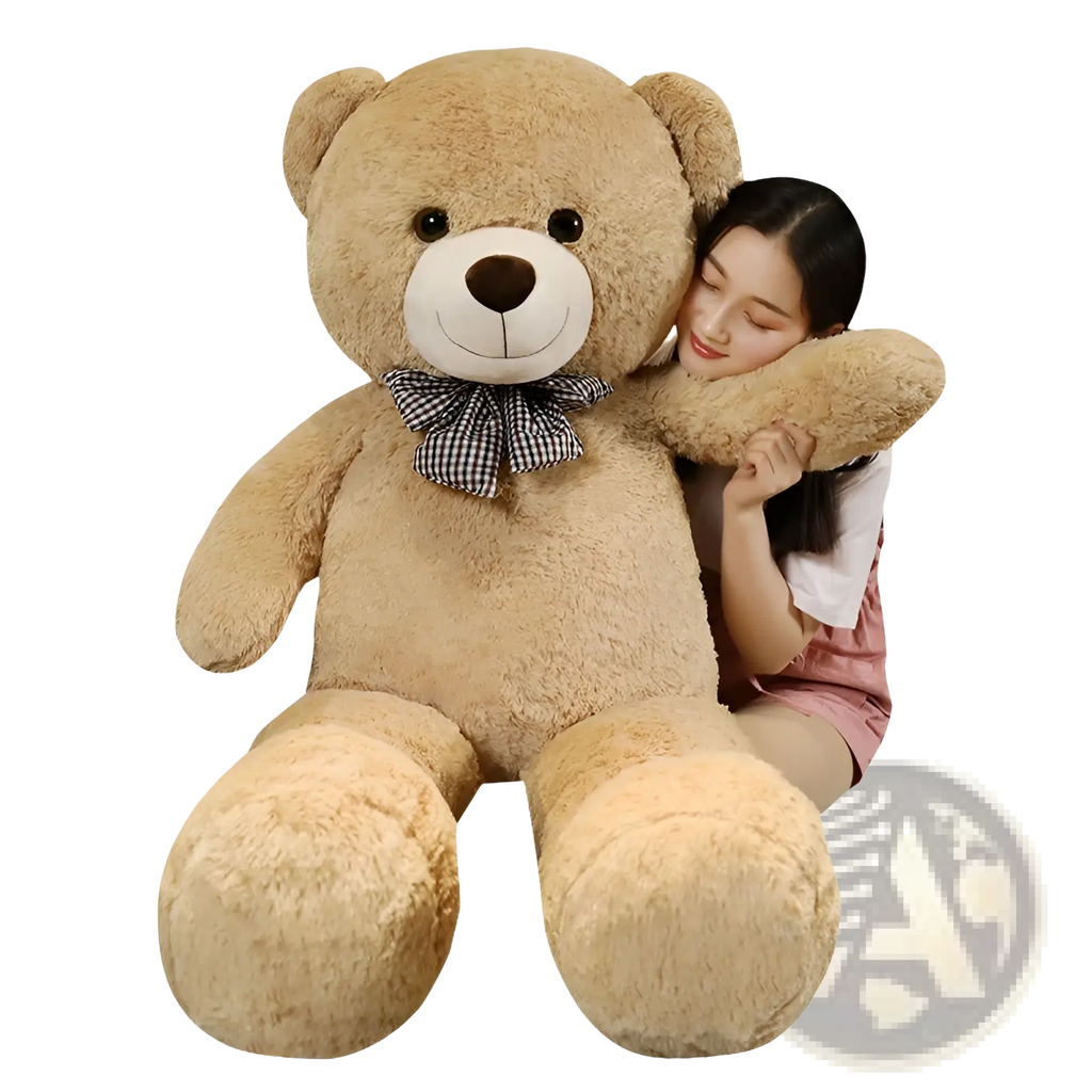 A plush tan teddy bear with white snout black button eyes and a checkered bow tie plush toy