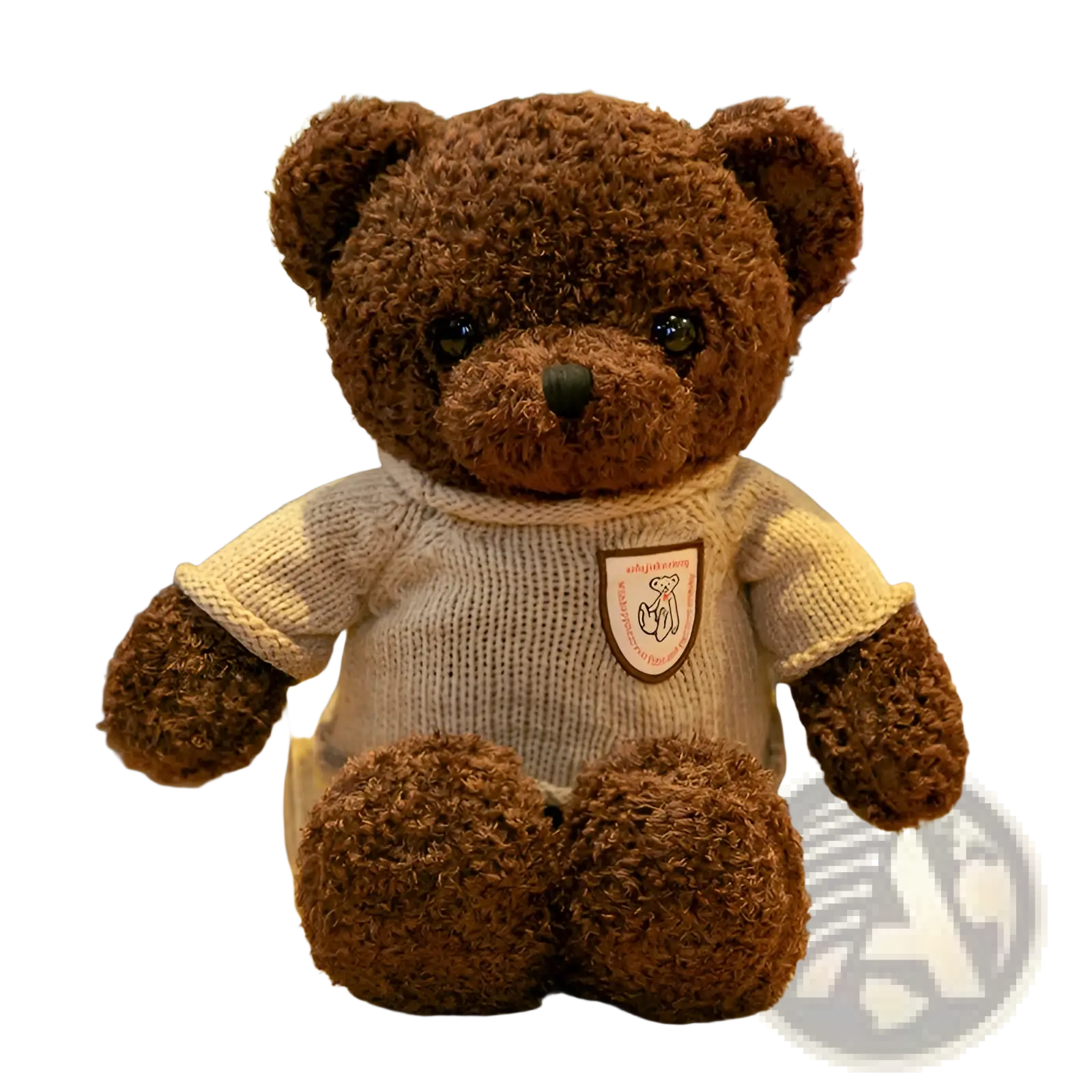 A plush brown teddy bear wearing a beige knitted sweater with a shield patch soft stuffed animal doll