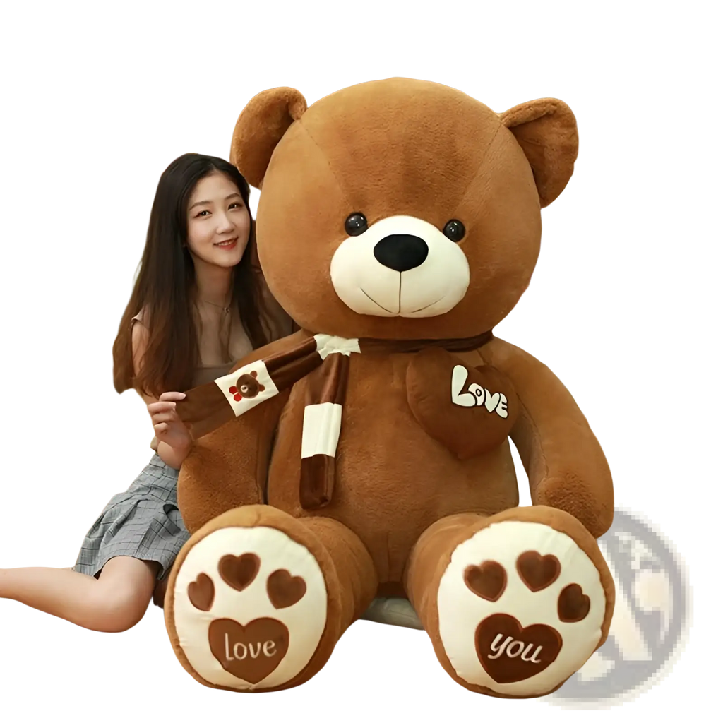 A plush brown teddy bear with white paw pads and a heart love patch holding an ice cream cone soft stuffed animal