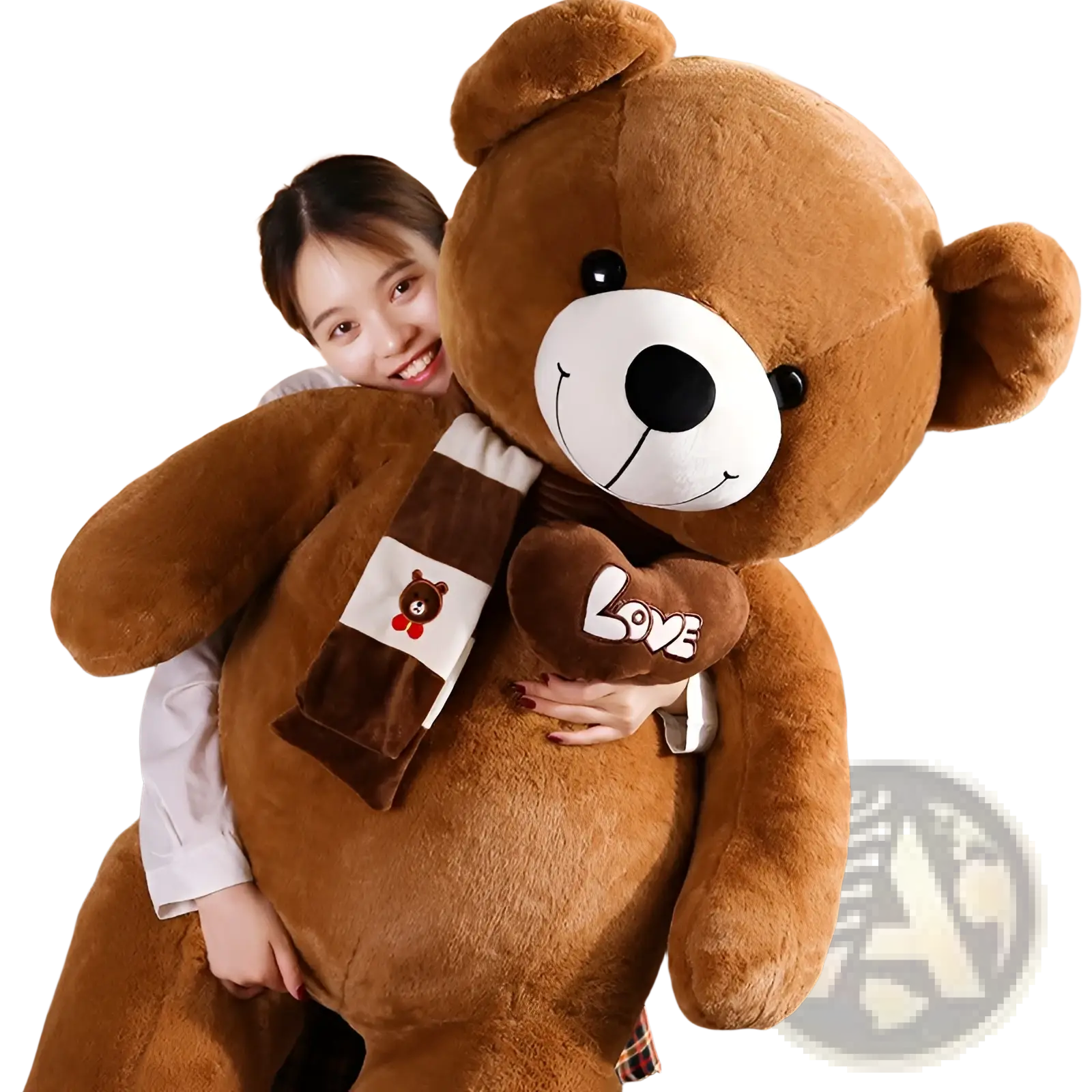 A plush brown teddy bear with white snout black eyes and nose wearing a scarf with a bear face patch soft stuffed animal doll