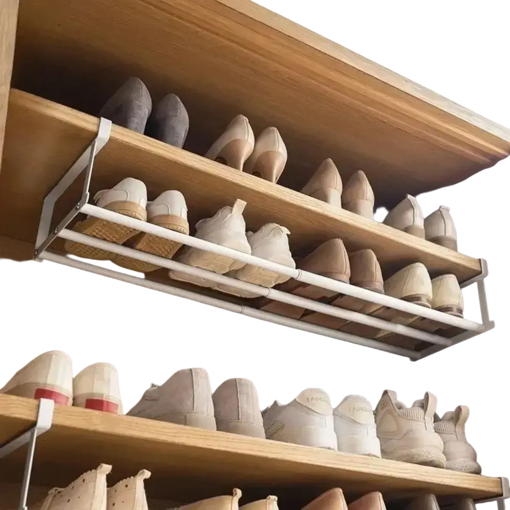 White metal telescopic shoe rack with minimalist design and wooden shelves holding neatly arranged shoes