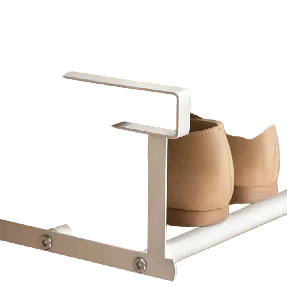 White metal telescopic shoe rack with minimalist design holding beige shoes on wooden shelves for metal storage organizer