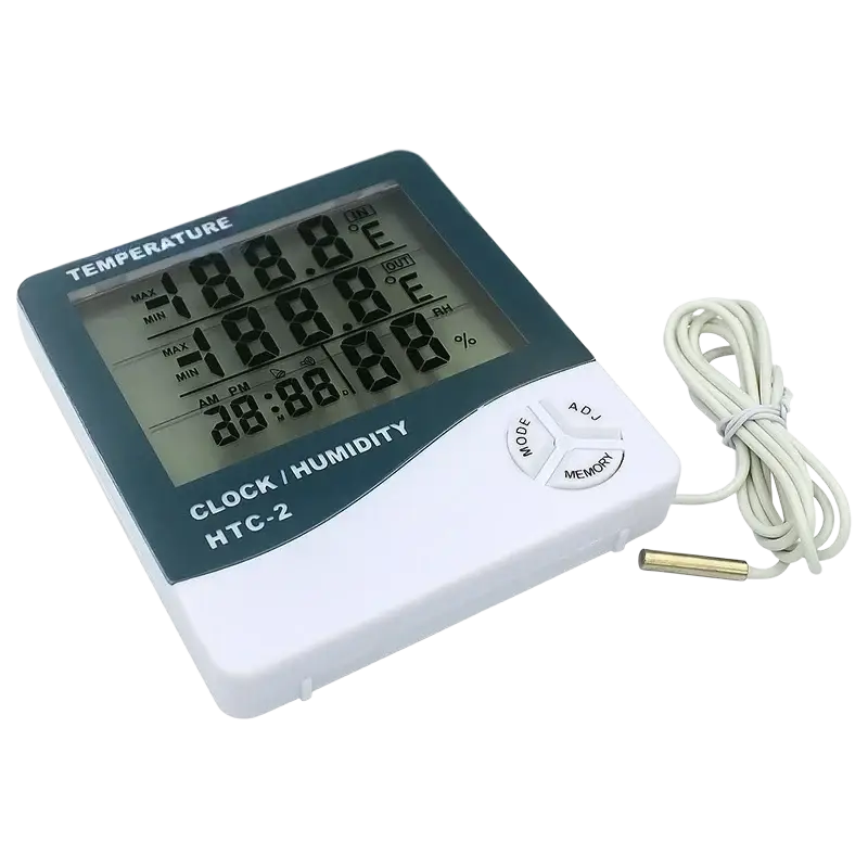 White and dark green digital indoor hygrometer clock with coiled sensor cable for temperature humidity and current time measurement