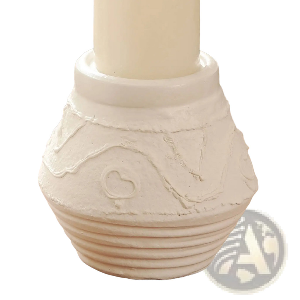 White ceramic terracotta candle holder with textured ridged base and embossed heart design for decorative use