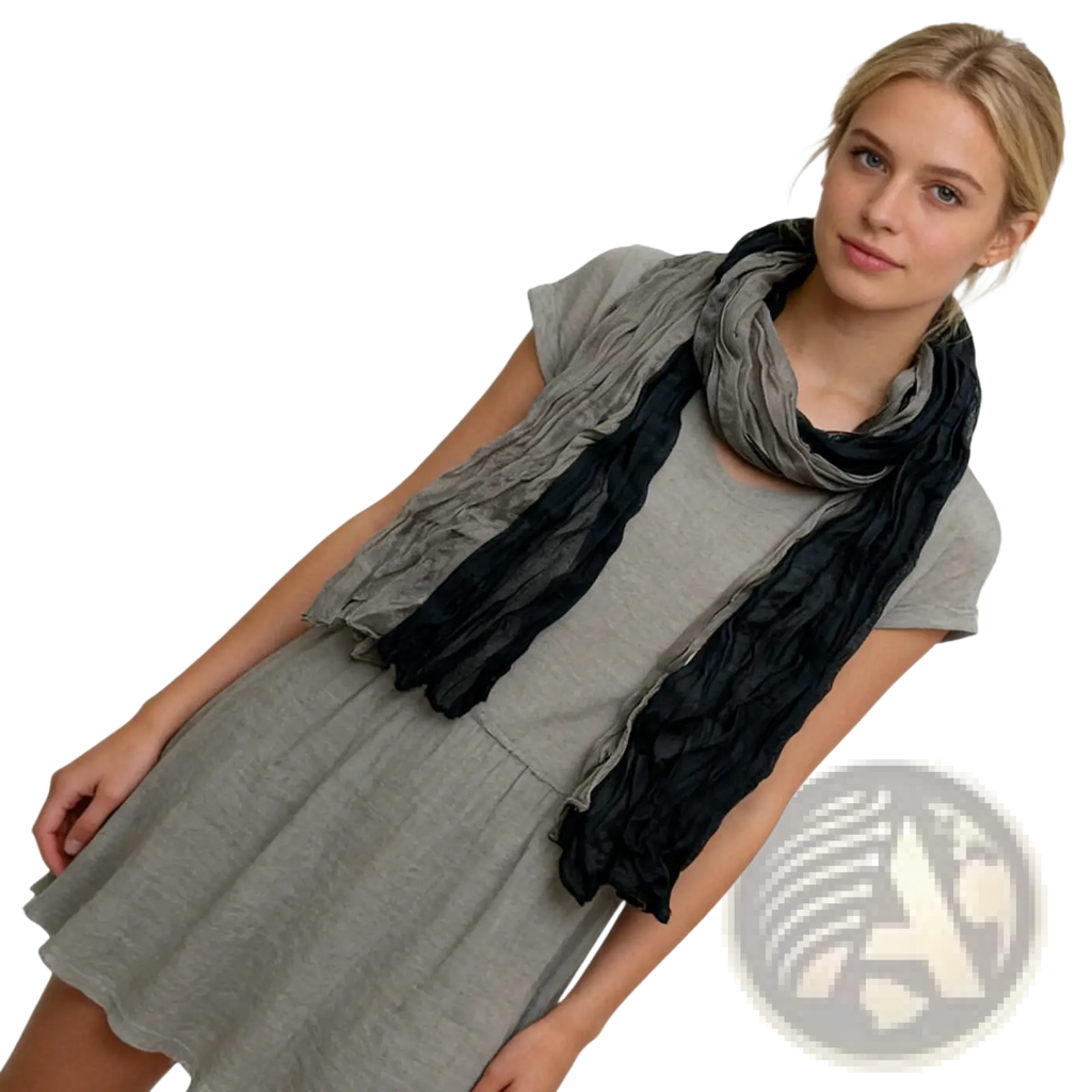 A textured black gray crinkle scarf with a soft gradient drapes elegantly around the model’s neck