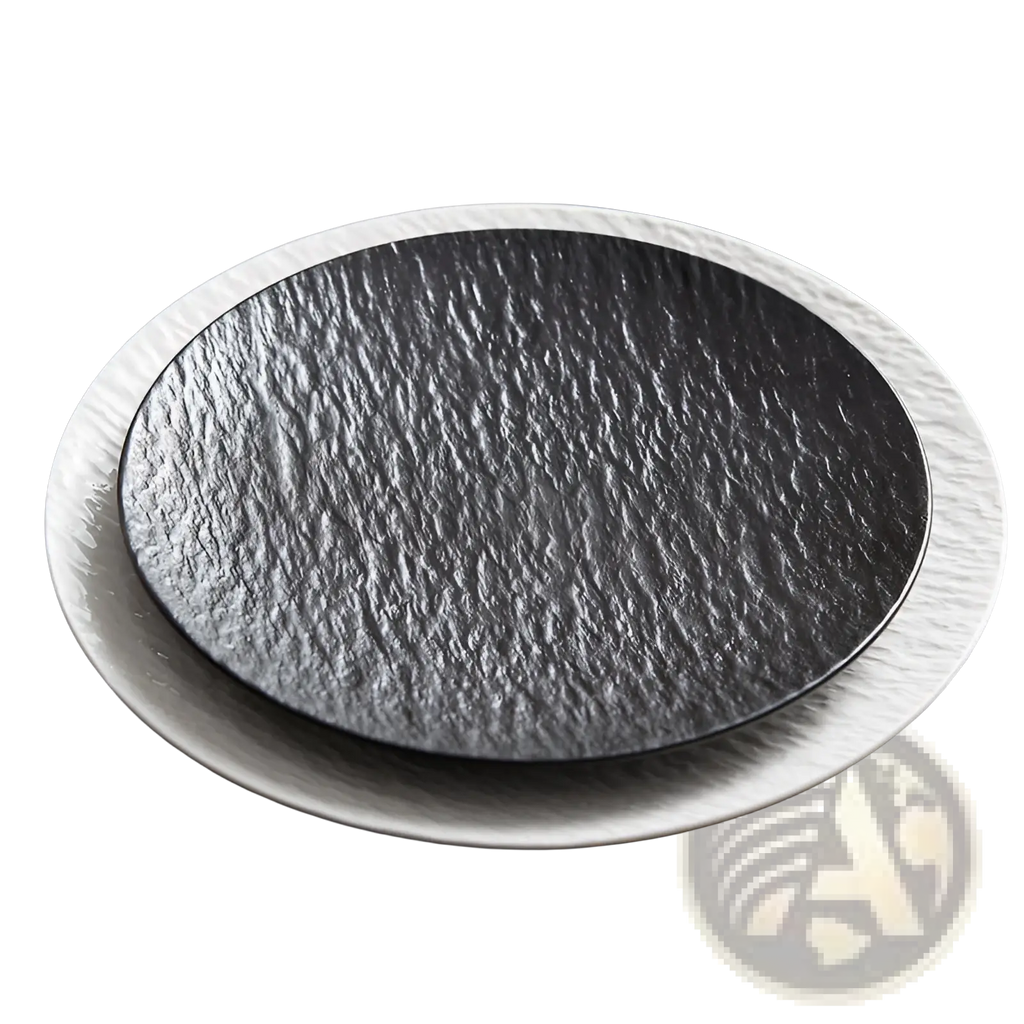 Black textured ceramic round plate with nordic rock pattern and subtle sheen on contrasting white ridged rim