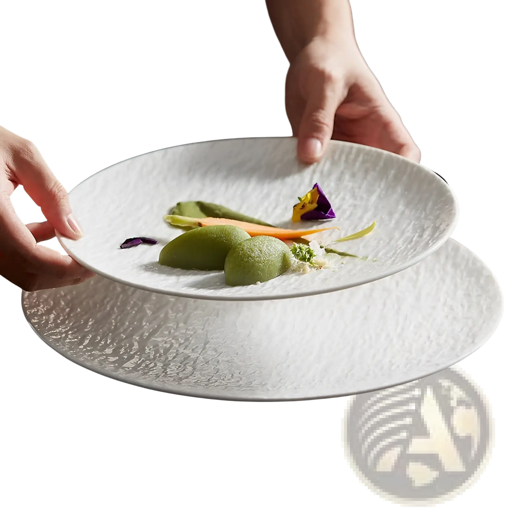 White ceramic round plates with a textured hammered finish featuring a nordic rock pattern design
