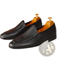 Black leather loafers with pebbled textured cowhide leather and a classic pointed toe slip-on design