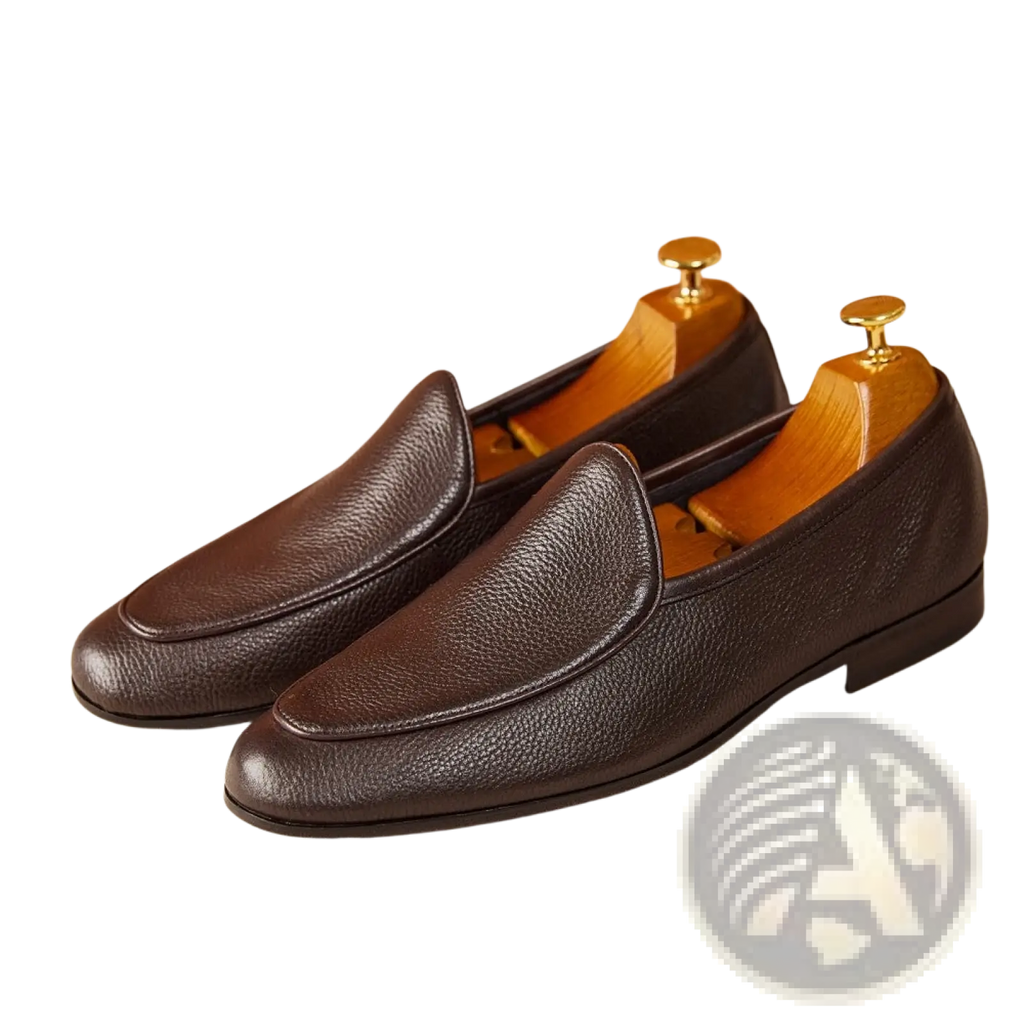 Brown textured cowhide leather loafers with pebbled texture and classic slip-on pointed toe design