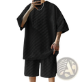 Black oversized short-sleeved cotton blend t-shirt with textured hexagonal pattern from geometric set