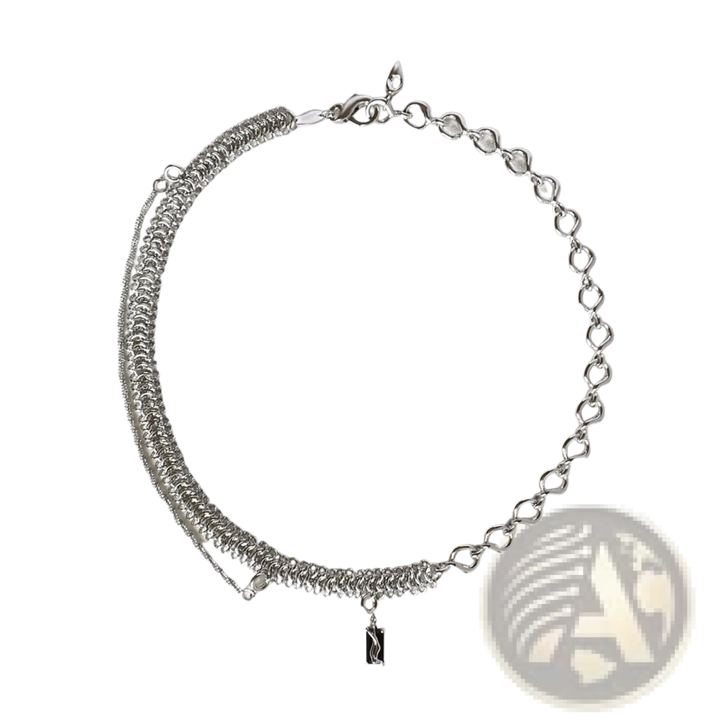 Textured heart link silver necklace with layered fine and thick chains featuring a small black rectangular charm