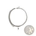 Textured heart link silver necklace with a woven design and a small black charm pendant