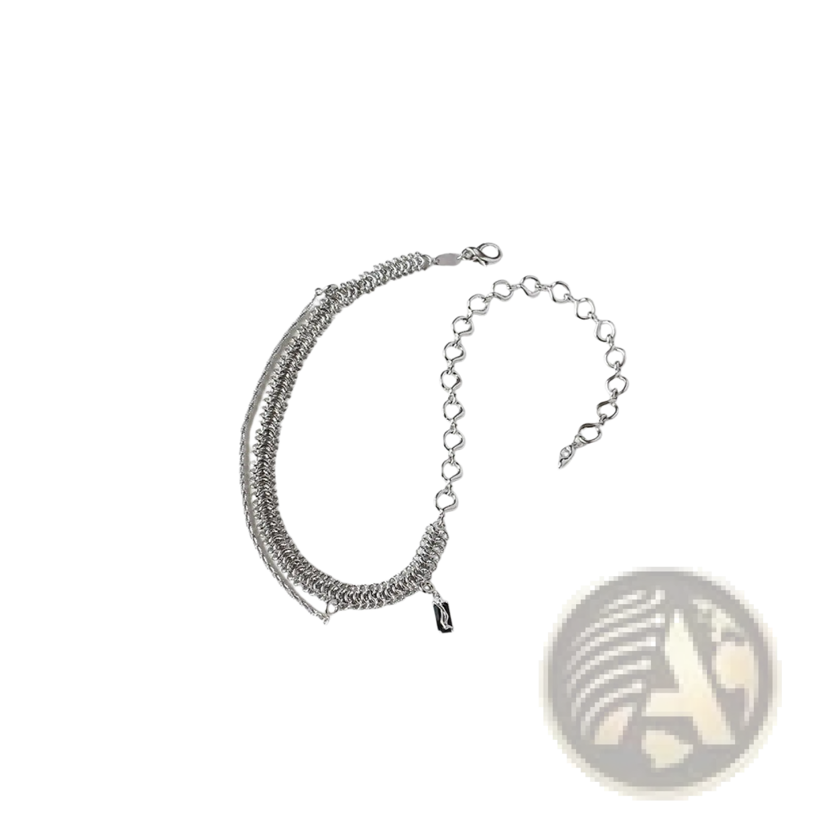 Silver chain bracelet with layered textured heart links and a small black charm in sterling silver