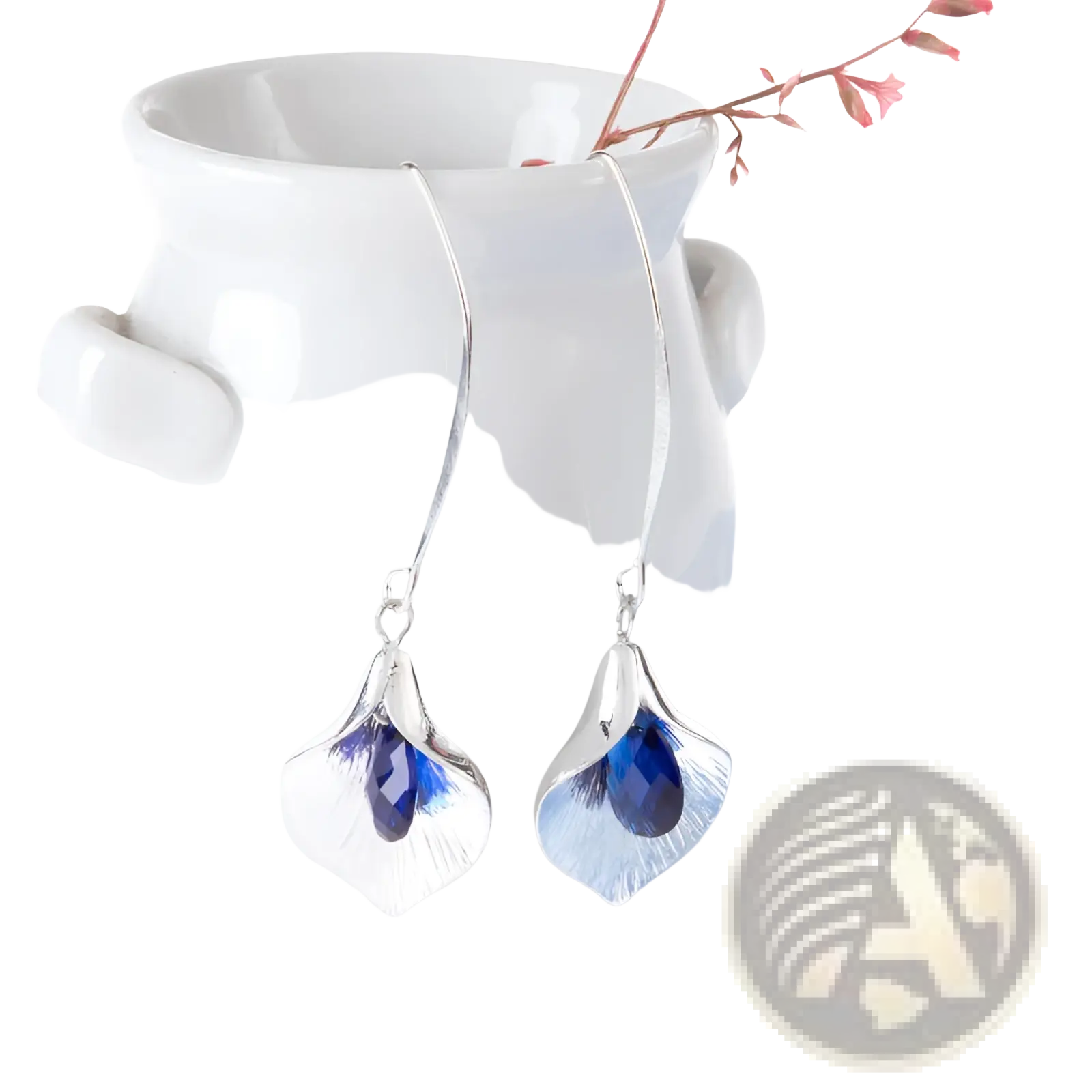 Textured silver orchid crystal drop earrings with delicate leaf-shaped design and central deep blue crystal accent