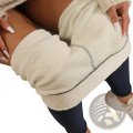 Cream-colored thermal fleece lined high waist leggings with plush material and black contrasting seam stitching