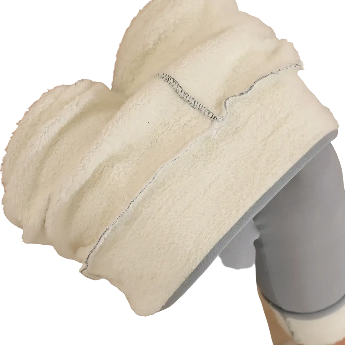 Thermal fleece lined high waist leggings shown with a white plush towel wrapped around a leg