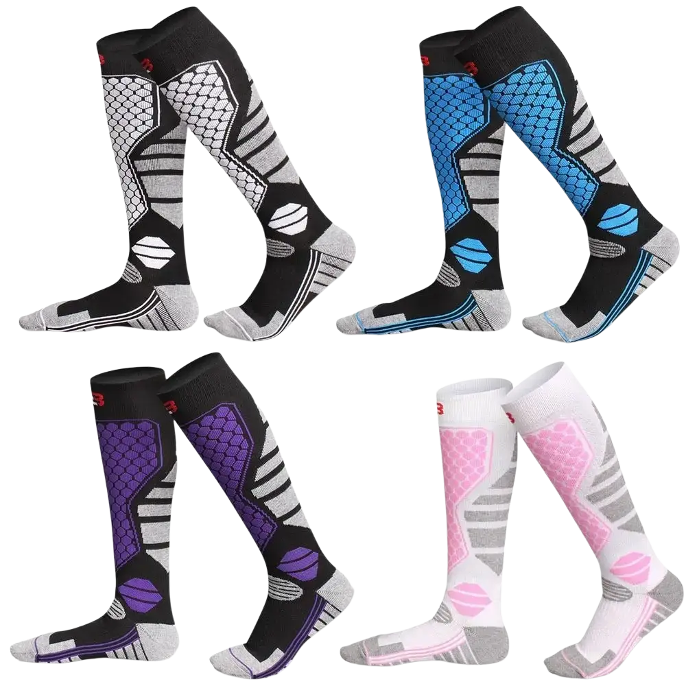 Thermal knee high ski socks in black gray and white feature hexagonal mesh panels and oval accents with geometric pattern