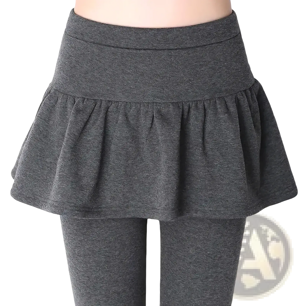 A soft heather gray fleece lined thermal skirt leggings with pleats and an elastic waistband for winter wear