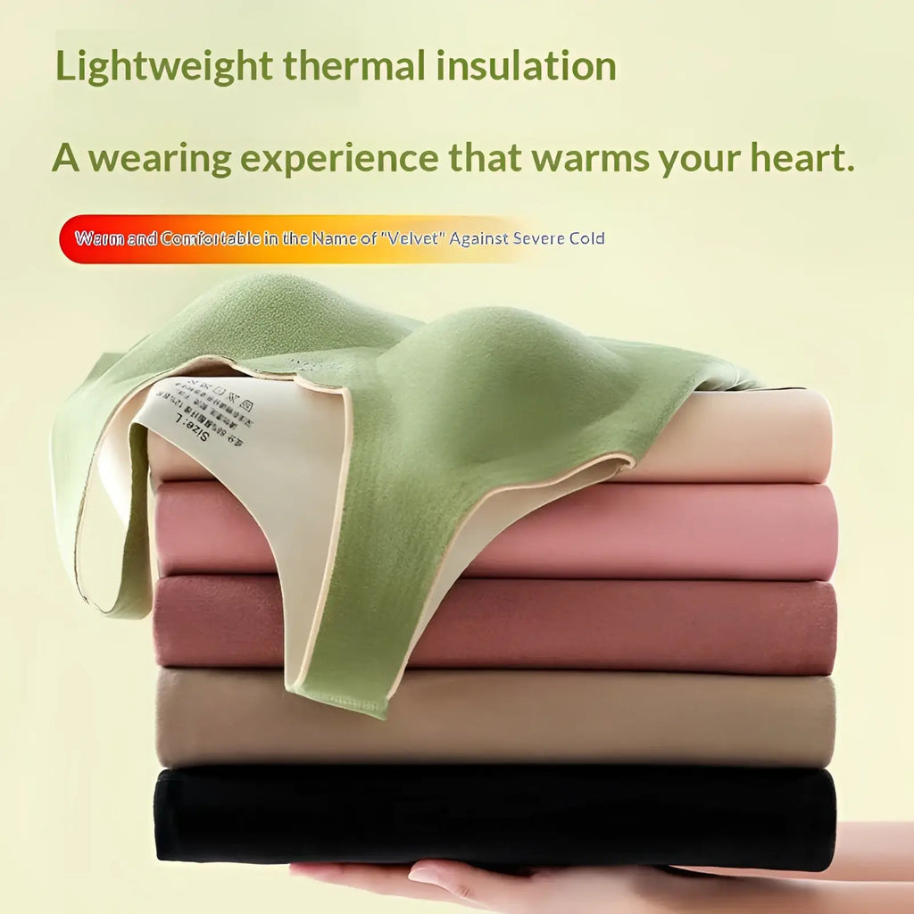Stack of soft lightweight thermal undershirts in pastel and neutral tones with dermlin fabric built-in bra feature