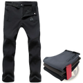 Black thermal waterproof hiking pants with reinforced knee panels made of durable water resistant fabric