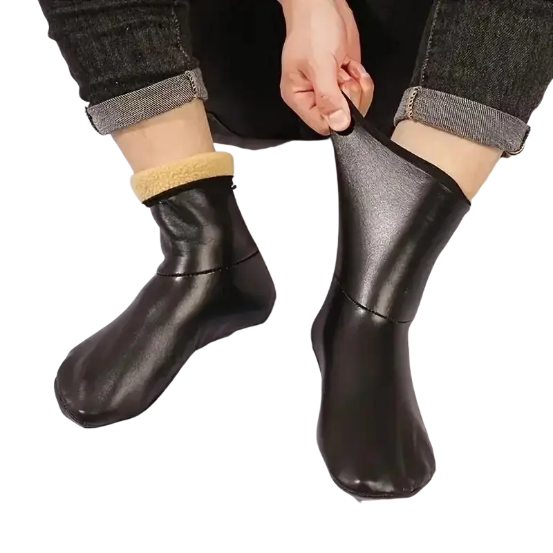 Black faux leather ankle boots with soft beige fleece lining paired with thick fleece middle tube winter socks