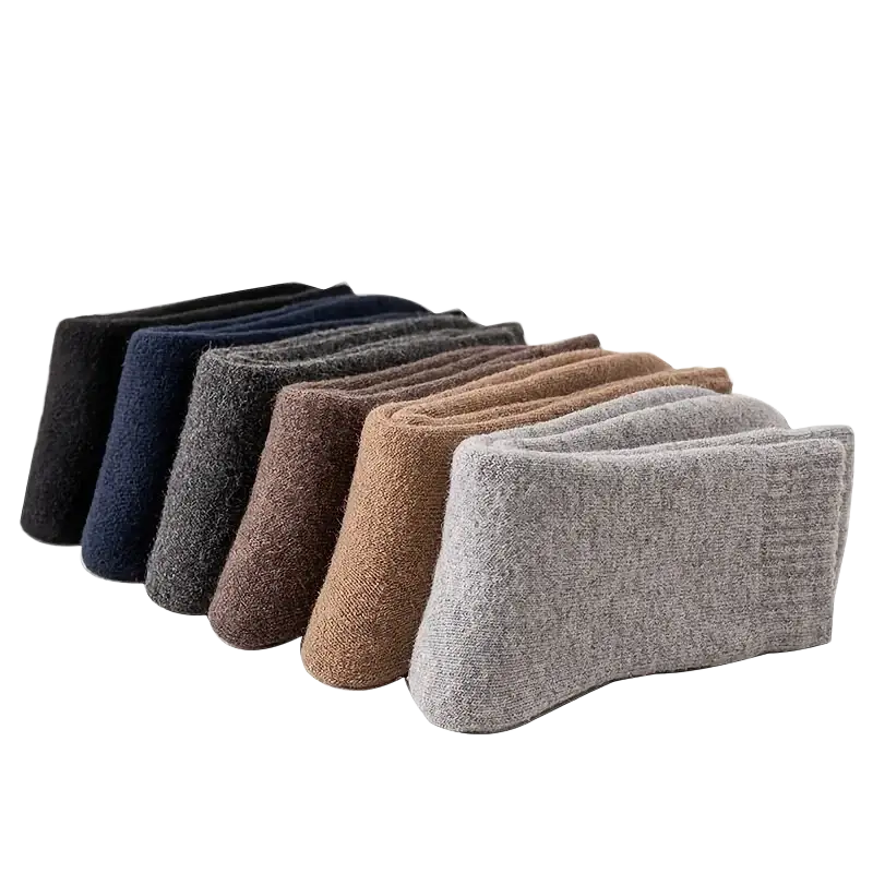 A collection of thick men winter snow socks in ribbed knit material with random color earthy tones