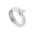 A sleek gold color stainless steel three circles knot ring for women with three overlapping bands and spherical accents