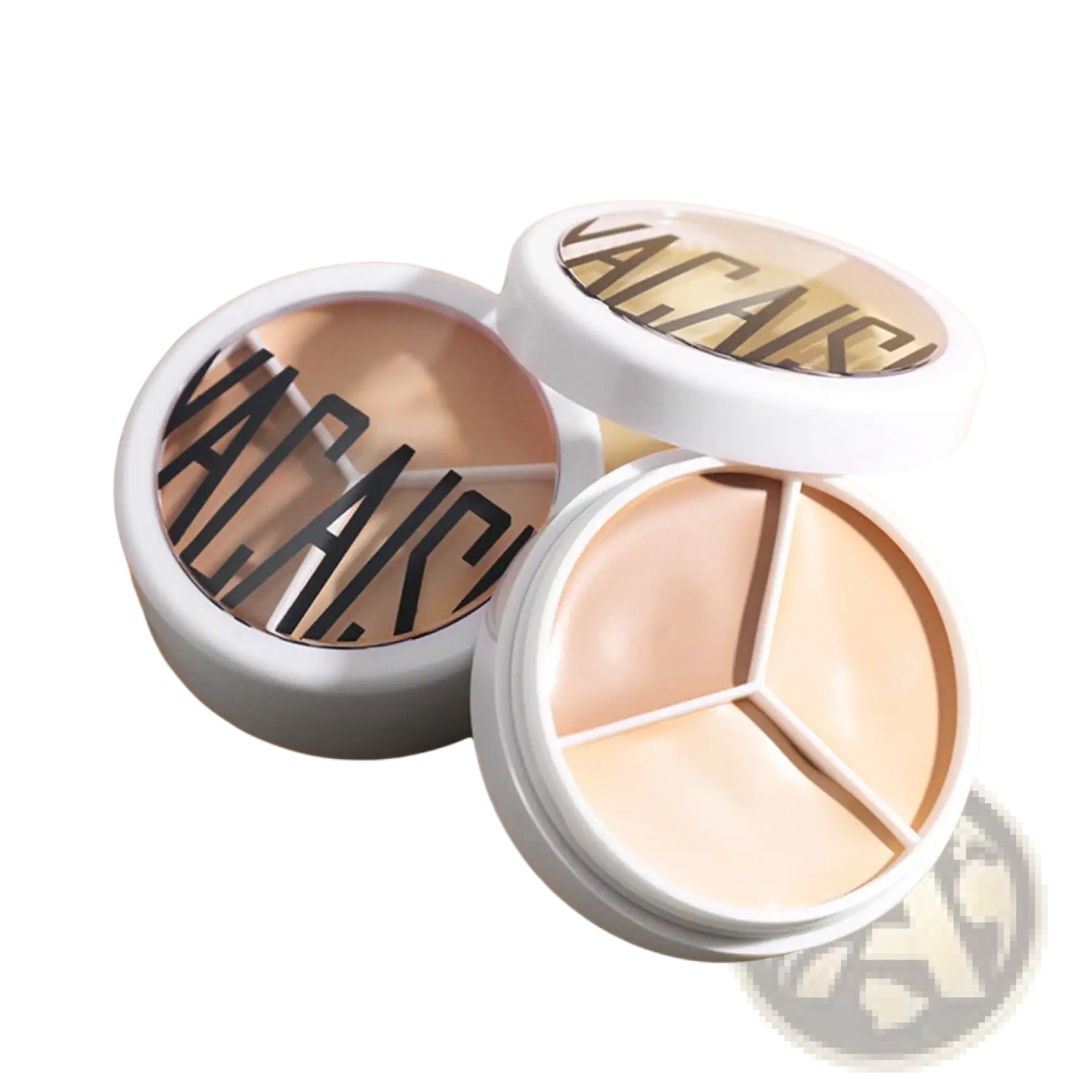 White circular three-color concealer palette with beige and peach shades and vacaiku branding on the lid
