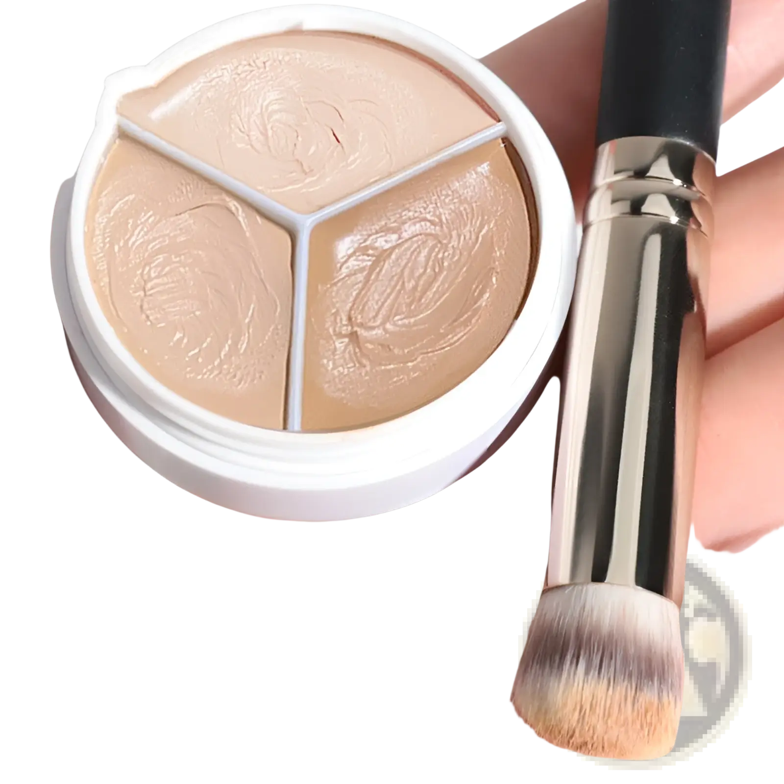 White round three-color concealer palette with beige shades separated by metallic dividers and pro 270 brush