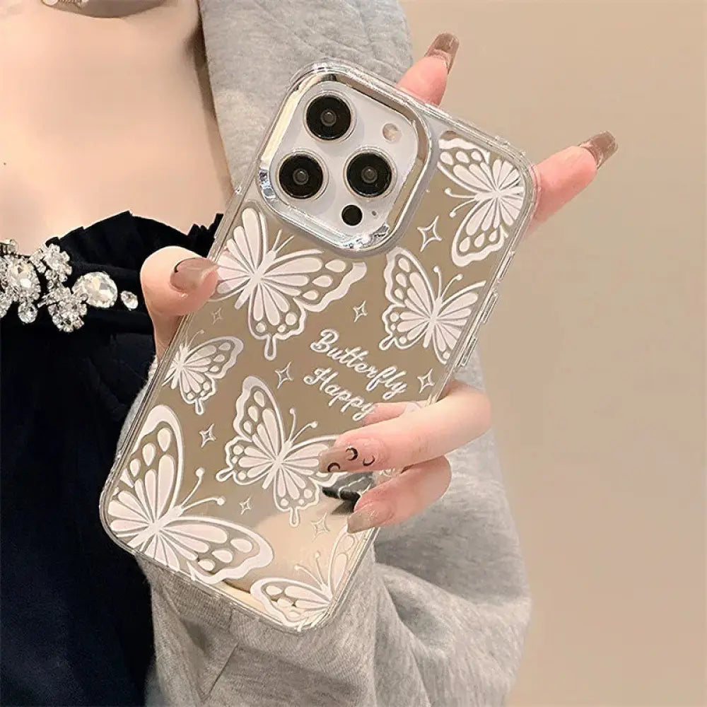 Back side of clear butterfly mirror iPhone 15 Pro Max protective case with white butterfly star decals and butterfly happy text