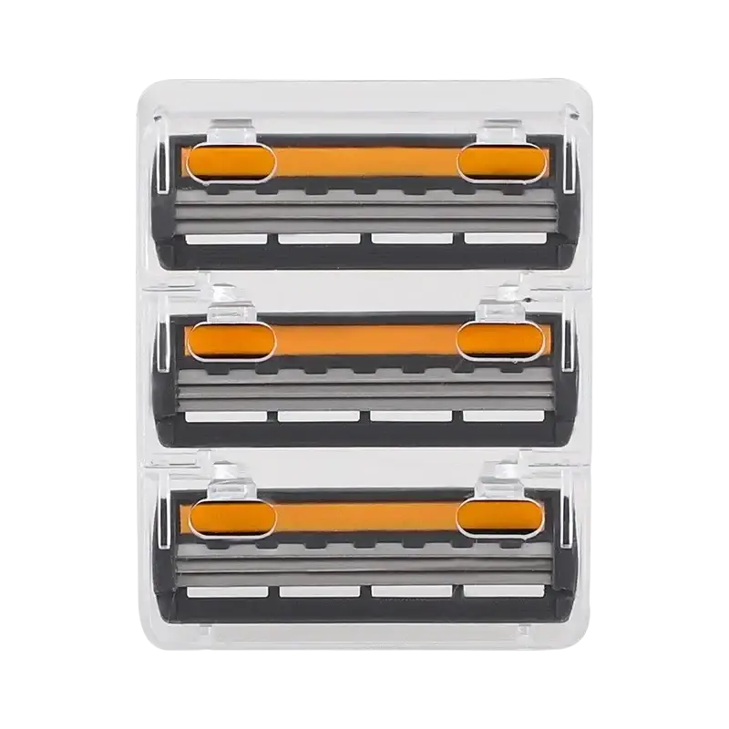 Three-pack of orange and black three layer blade razor blades in clear plastic packaging for replacement use